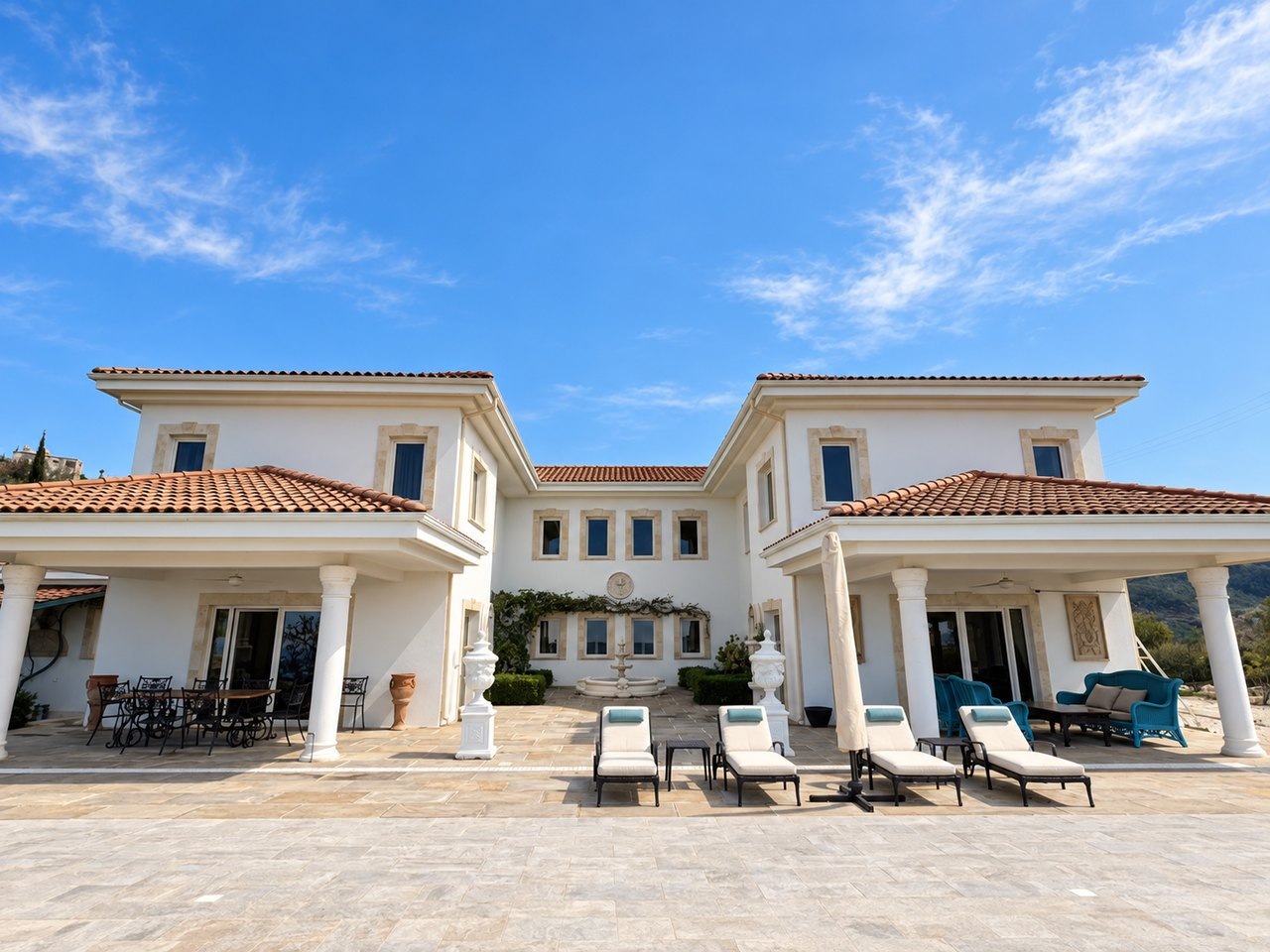 Villa Onassa and the full terrace viewed from beside the pool